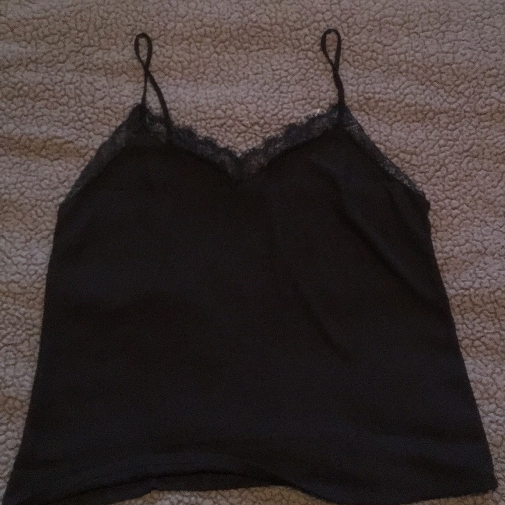 Light weight tank with lace trim around top